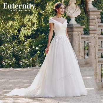 Rafine V Boyun düğün elbisesi Bir Çizgi Cap Kollu Gelin kıyafeti Dantel Aplikler Illusion Geri Düğmeler Sweep Tren Vestidos De Novia