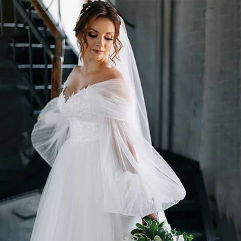 Bohemian düğün elbisesi A-Line V Yaka Tankı Dantel Aplikler Tam Puf SleevesFloor Uzunluk Sweep Tren Gelin kıyafeti Tailor Made Yeni