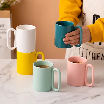 Iskandinav Yaratıcı Seramik oval saplı kupa Benzersiz Porselen Fincan Kahve Çay Süt Su Mutfak Ofis Ev masa süsü Hediye